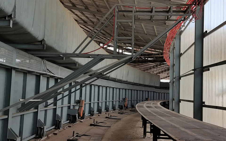Kiln-side equipment and curved conveying route at the Cambodia mobile tunnel kiln